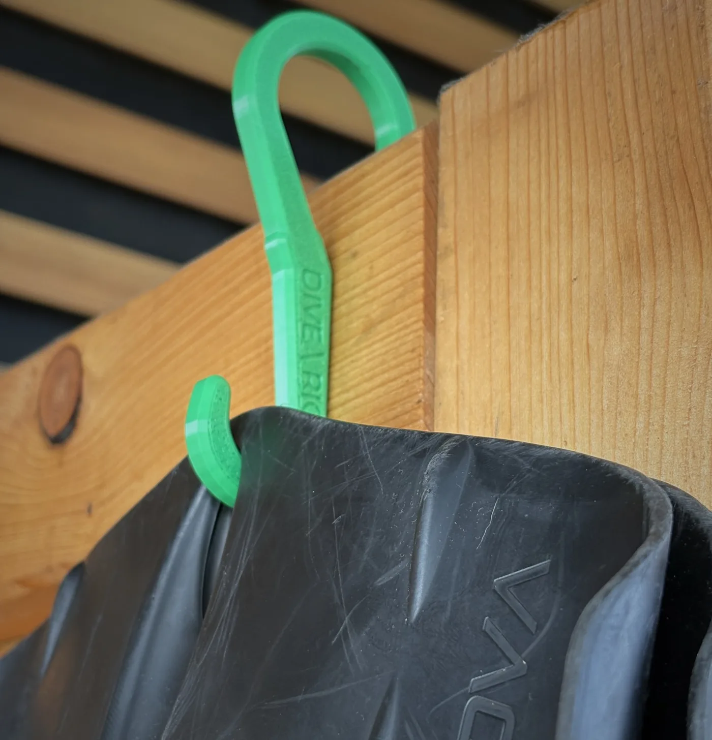 Fin hook on a wooden shelf edge