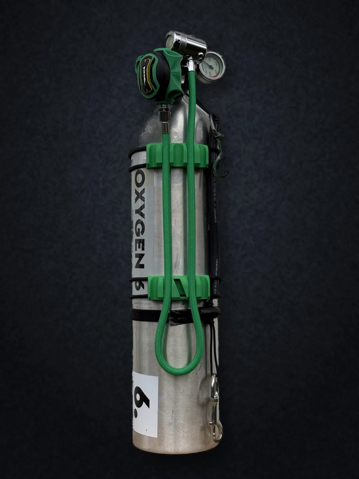 HoseDock™ pair on a stage cylinder, two hoses held flat