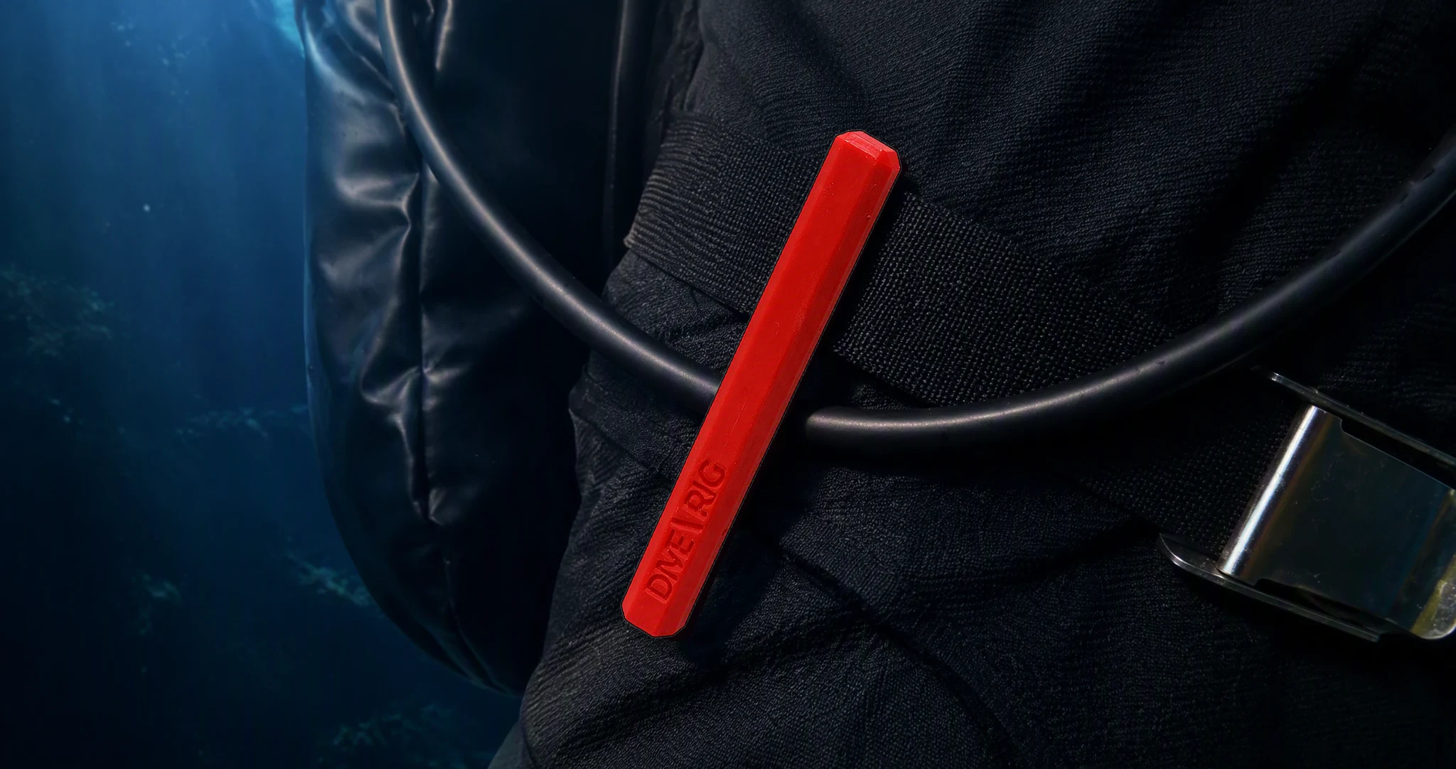 Hose Retainer clipped to a waist belt, long hose routed through the slot